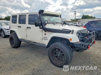 Czwarte zdjęcie samochodu z boku: 2010 JEEP WRANGLER UNLIMITED SPORT VIN:1J4BA3H12AL101667 - miniatura