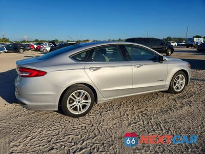 Trzecie zdjęcie samochodu z tyłu: 2018 FORD FUSION SE HYBRID VIN:3FA6P0LU1JR200896 - miniatura
