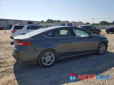 Trzecie zdjęcie samochodu z tyłu: 2018 FORD FUSION SE VIN:3FA6P0HD4JR203817 - miniatura