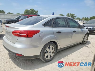 Trzecie zdjęcie samochodu z tyłu: 2015 FORD FOCUS S VIN:1FADP3E27FL275015 - miniatura