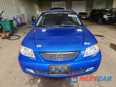 Piąte zdjęcie samochodu w środku: 2003 MAZDA PROTEGE DX VIN:JM1BJ225231158946 - miniatura
