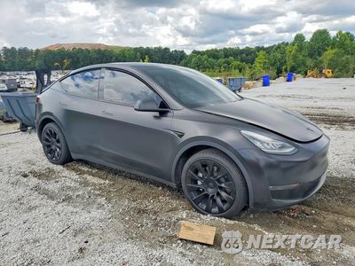 Czwarte zdjęcie samochodu z boku: 2021 TESLA MODEL Y VIN:5YJYGDEEXMF125055 - miniatura