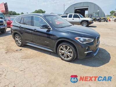 Czwarte zdjęcie samochodu z boku: 2016 BMW X1 VIN:WBXHT3Z35G4A49177 - miniatura