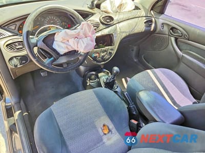 Zdjęcie 8 z 12 samochodu: 2001 FORD FOCUS ZX3 VIN:3FAFP31351R191440 - miniatura