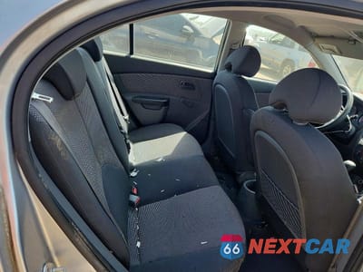 Zdjęcie 10 z 12 samochodu: 2010 KIA RIO BASE VIN:KNADH4A34A6682855 - miniatura