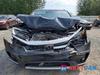 Piąte zdjęcie samochodu w środku: 2022 HONDA PILOT TOURING VIN:5FNYF5H99NB014716 - miniatura