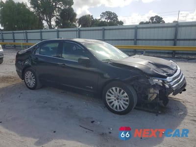Czwarte zdjęcie samochodu z boku: 2010 FORD FUSION HYBRID VIN:3FADP0L31AR290923 - miniatura