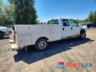 Trzecie zdjęcie samochodu z tyłu: 2002 FORD F350 SUPER DUTY VIN:1FDWW37F82ED28482 - miniatura