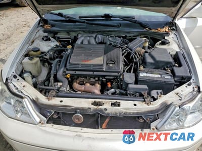 Zdjęcie 11 z 12 samochodu: 2002 TOYOTA AVALON XLS VIN:4T1BF28B92U263488 - miniatura