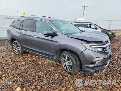 Czwarte zdjęcie samochodu z boku: 2018 HONDA PILOT TOURING VIN:5FNYF6H93JB037781 - miniatura