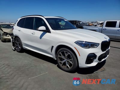 Czwarte zdjęcie samochodu z boku: 2021 BMW X5 XDRIVE45E VIN:5UXTA6C07M9G09047 - miniatura