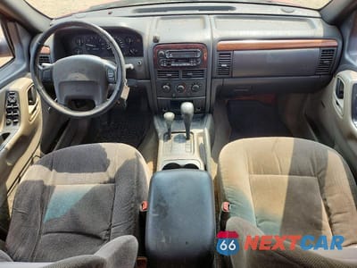 Zdjęcie 8 z 13 samochodu: 1999 JEEP GRAND CHEROKEE LAREDO VIN:1J4GW58S8XC588362 - miniatura