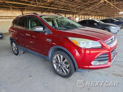 Czwarte zdjęcie samochodu z boku: 2016 FORD ESCAPE SE VIN:1FMCU0G94GUB83357 - miniatura