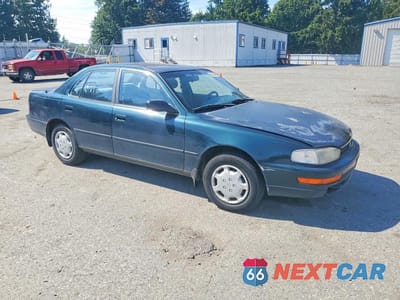 Czwarte zdjęcie samochodu z boku: 1993 TOYOTA CAMRY LE VIN:JT2SK12E2P0150129 - miniatura