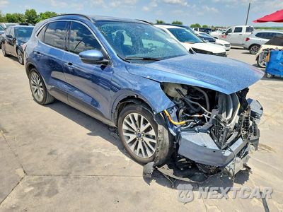 Czwarte zdjęcie samochodu z boku: 2020 FORD ESCAPE TITANIUM VIN:1FMCU0DZ7LUC37278 - miniatura