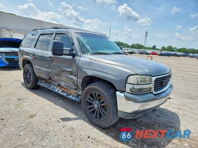 Czwarte zdjęcie samochodu z boku: 2001 GMC YUKON VIN:1GKEK13T11J229685 - miniatura