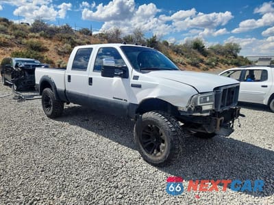 Czwarte zdjęcie samochodu z boku: 2001 FORD F350 SRW SUPER DUTY VIN:1FTSW31F91EA57118 - miniatura