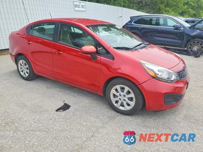 Czwarte zdjęcie samochodu z boku: 2012 KIA RIO LX VIN:KNADM4A3XC6056127 - miniatura