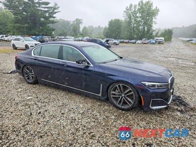 Czwarte zdjęcie samochodu z boku: 2020 BMW 750 XI VIN:WBA7U2C09LBM62153 - miniatura