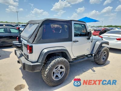 Trzecie zdjęcie samochodu z tyłu: 2010 JEEP WRANGLER SPORT VIN:1J4AA2D10AL167632 - miniatura