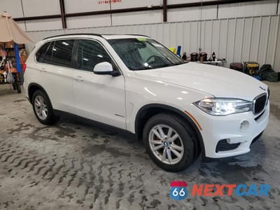 Czwarte zdjęcie samochodu z boku: 2014 BMW X5 SDRIVE35I VIN:5UXKR2C54E0C01958 - miniatura