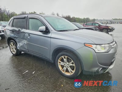 Czwarte zdjęcie samochodu z boku: 2015 MITSUBISHI OUTLANDER SE VIN:JA4AZ3A38FZ004445 - miniatura