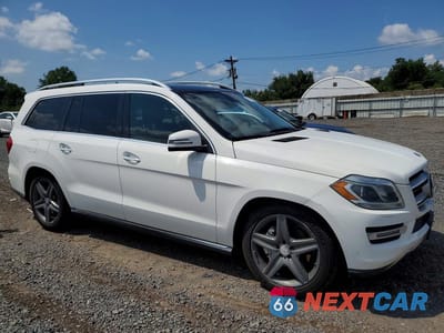 Czwarte zdjęcie samochodu z boku: 2014 MERCEDES-BENZ GL 450 4MATIC VIN:4JGDF7CE1EA325138 - miniatura