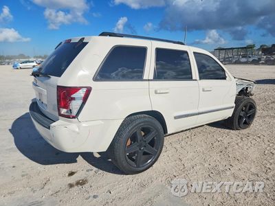 Trzecie zdjęcie samochodu z tyłu: 2010 JEEP GRAND CHEROKEE LARED VIN:1J4PR4GK2AC150592 - miniatura