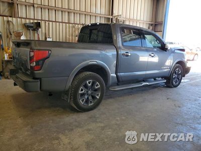 Trzecie zdjęcie samochodu z tyłu: 2021 NISSAN TITAN PLATINUM RESERVE VIN:1N6AA1ED0MN511104 - miniatura