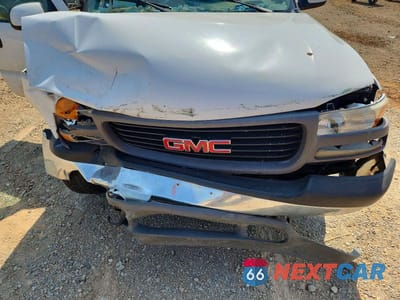 Zdjęcie 11 z 12 samochodu: 1999 GMC NEW SIERRA C1500 VIN:1GTEC14V6XE548381 - miniatura