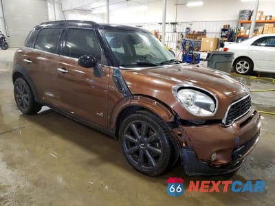 Czwarte zdjęcie samochodu z boku: 2013 MINI COOPER S COUNTRYMAN VIN:WMWZC5C5XDWP34101 - miniatura
