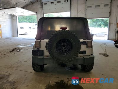 Zdjęcie 6 z 12 samochodu: 2011 JEEP WRANGLER SPORT VIN:1J4AA2D10BL511266 - miniatura