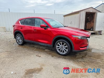 Czwarte zdjęcie samochodu z boku: 2021 MAZDA CX-5 GRAND TOURING VIN:JM3KFADM2M0427509 - miniatura