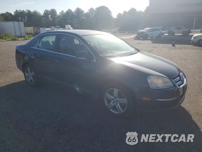 Czwarte zdjęcie samochodu z boku: 2009 VOLKSWAGEN JETTA SE VIN:3VWRM71K29M172557 - miniatura