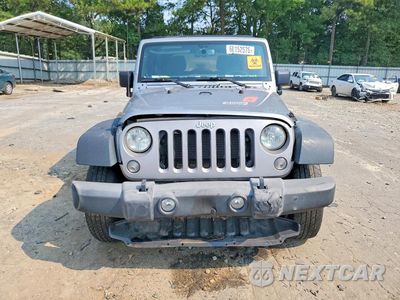 Piąte zdjęcie samochodu w środku: 2016 JEEP WRANGLER UNLIMITED SPORT VIN:1C4BJWDG3GL315481 - miniatura