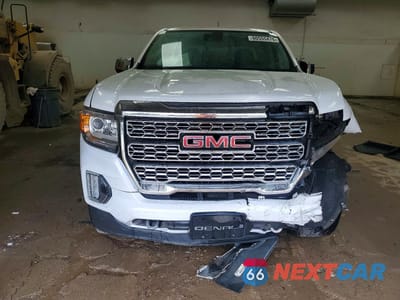 Piąte zdjęcie samochodu w środku: 2022 GMC CANYON DENALI VIN:1GTG6EEN3N1140799 - miniatura