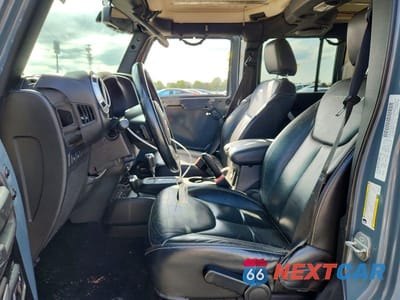 Zdjęcie 7 z 12 samochodu: 2014 JEEP WRANGLER UNLIMITED RUBICON VIN:1C4BJWFG0EL297144 - miniatura