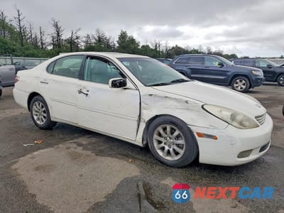 Czwarte zdjęcie samochodu z boku: 2002 LEXUS ES 300 VIN:JTHBF30G420030707 - miniatura