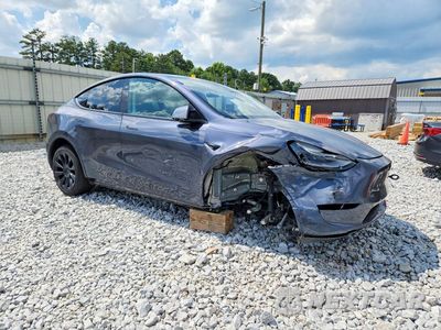 Czwarte zdjęcie samochodu z boku: 2023 TESLA MODEL Y VIN:7SAYGDED0PF933946 - miniatura