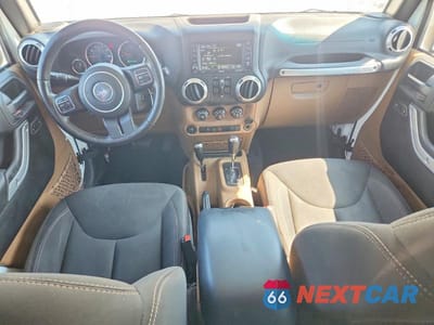 Zdjęcie 8 z 12 samochodu: 2017 JEEP WRANGLER UNLIMITED SAHARA VIN:1C4BJWEG7HL594174 - miniatura