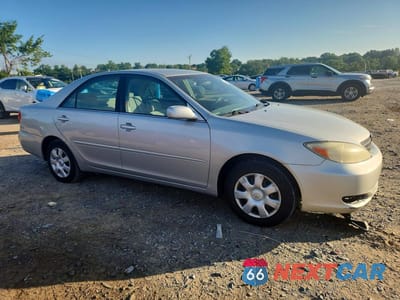 Czwarte zdjęcie samochodu z boku: 2003 TOYOTA CAMRY LE VIN:4T1BE30K03U750276 - miniatura