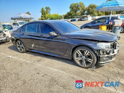 Czwarte zdjęcie samochodu z boku: 2018 BMW 740 I VIN:WBA7E2C51JG741976 - miniatura