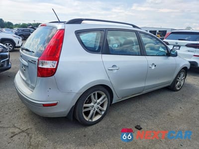 Trzecie zdjęcie samochodu z tyłu: 2010 HYUNDAI ELANTRA TOURING SE VIN:KMHDC8AE1AU077497 - miniatura