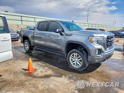 Czwarte zdjęcie samochodu z boku: 2021 GMC SIERRA K1500 AT4 VIN:3GTP9EEL9MG160576 - miniatura