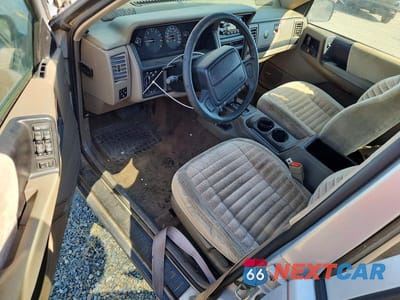 Zdjęcie 8 z 13 samochodu: 1995 JEEP GRAND CHEROKEE LAREDO VIN:1J4GZ58S5SC638375 - miniatura