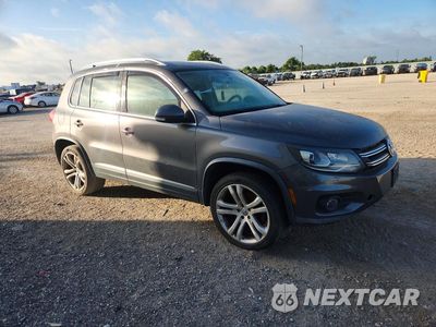 Czwarte zdjęcie samochodu z boku: 2012 VOLKSWAGEN TIGUAN S VIN:WVGAV7AX1CW001326 - miniatura