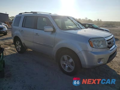 Czwarte zdjęcie samochodu z boku: 2009 HONDA PILOT TOURING VIN:5FNYF38889B022470 - miniatura