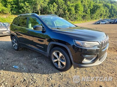 Czwarte zdjęcie samochodu z boku: 2019 JEEP CHEROKEE LIMITED VIN:1C4PJMDX1KD200911 - miniatura