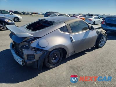 Trzecie zdjęcie samochodu z tyłu: 2012 NISSAN 370Z BASE/TOURING/NISMO VIN:JN1AZ4EH1CM563820 - miniatura