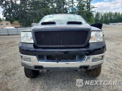Piąte zdjęcie samochodu w środku: 2004 FORD F150 VIN:1FTPX14524NB34989 - miniatura